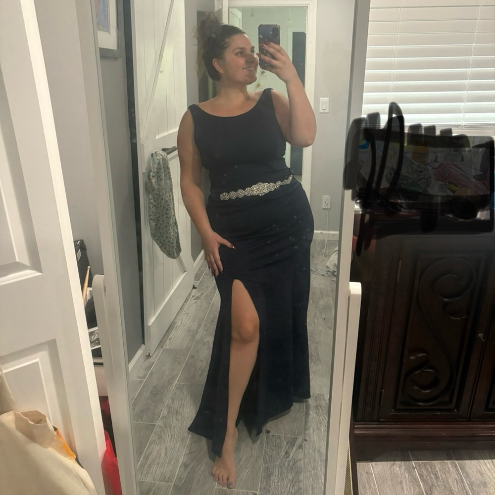 Ed Young High Neckline Navy Gown with Bejeweled belt and leg slit